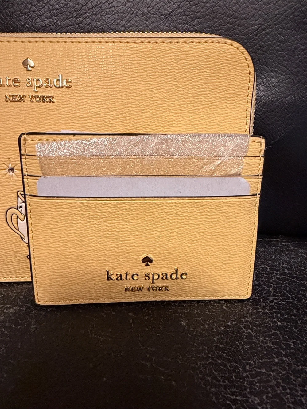 kate spade yellow Beauty and the Beast Chip & Mrs. Potts Wristlet Set